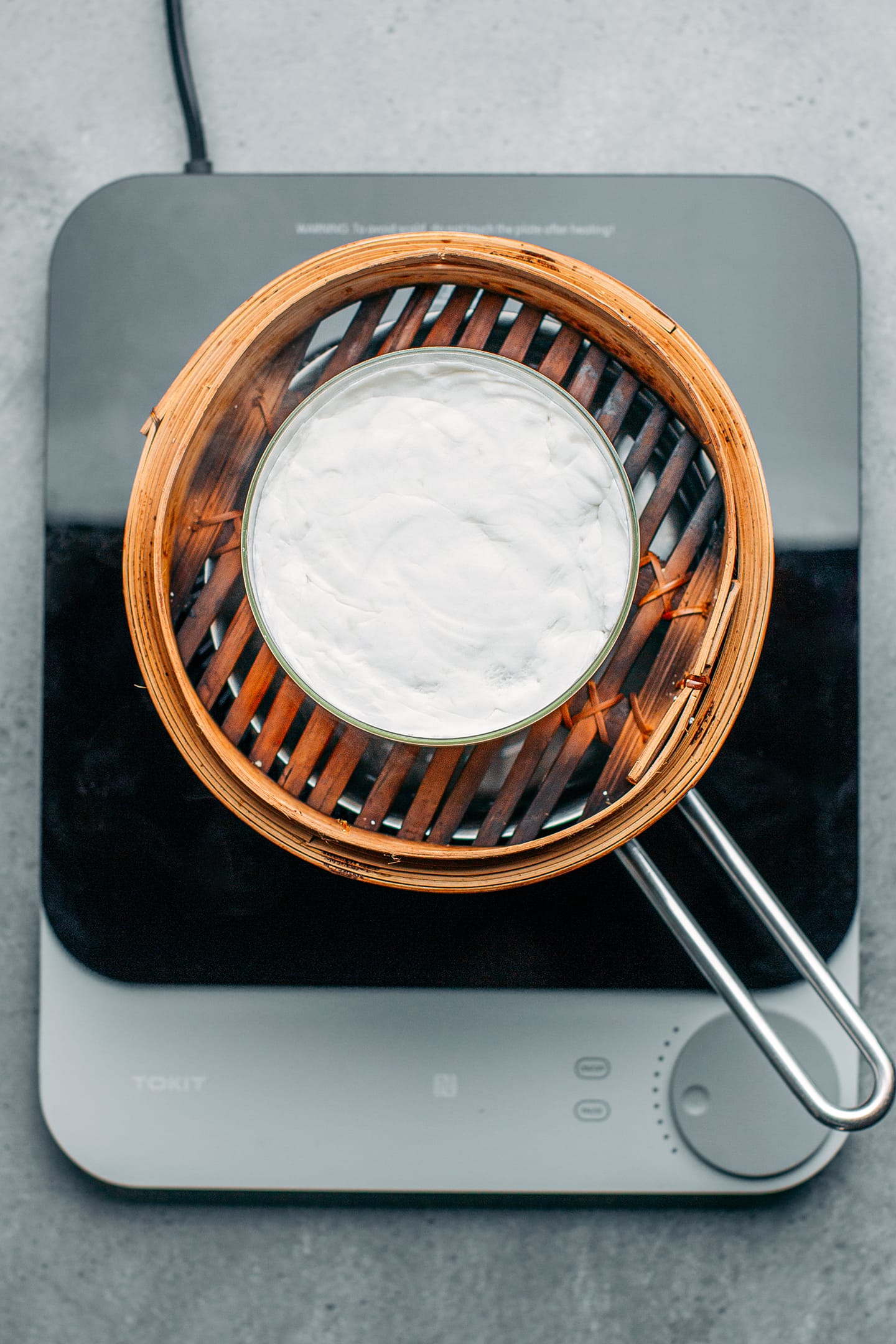 Rice flour cake in a bamboo steamer.