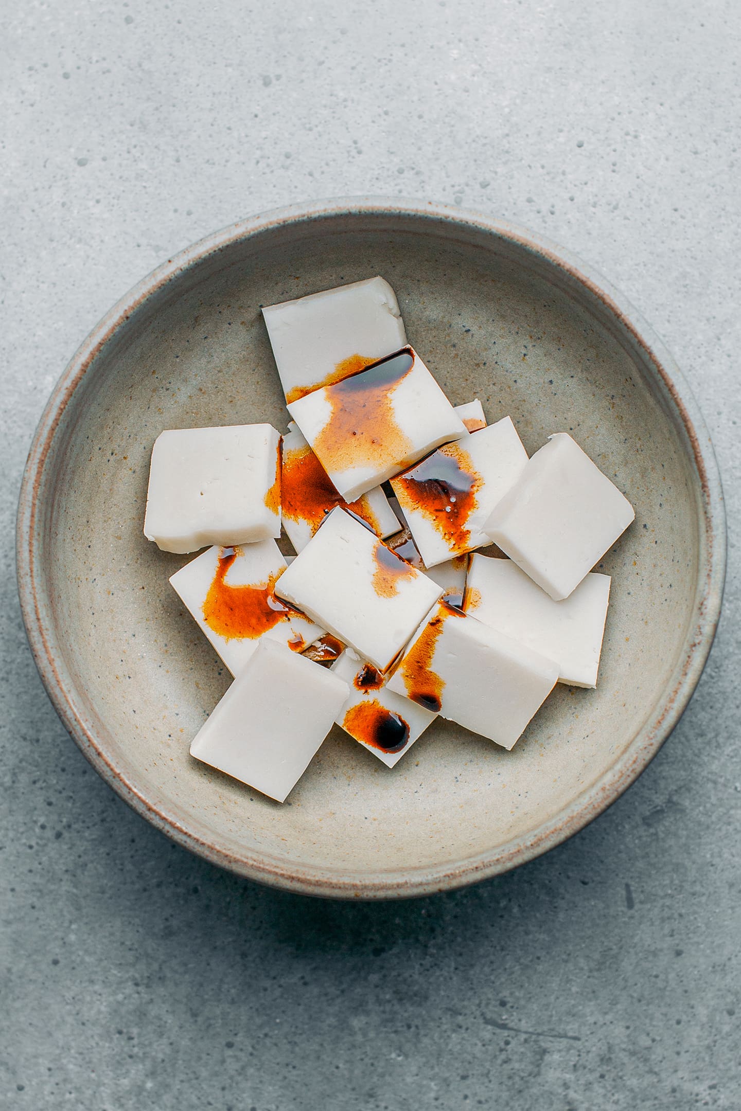 Bot chien and soy sauce in a bowl.