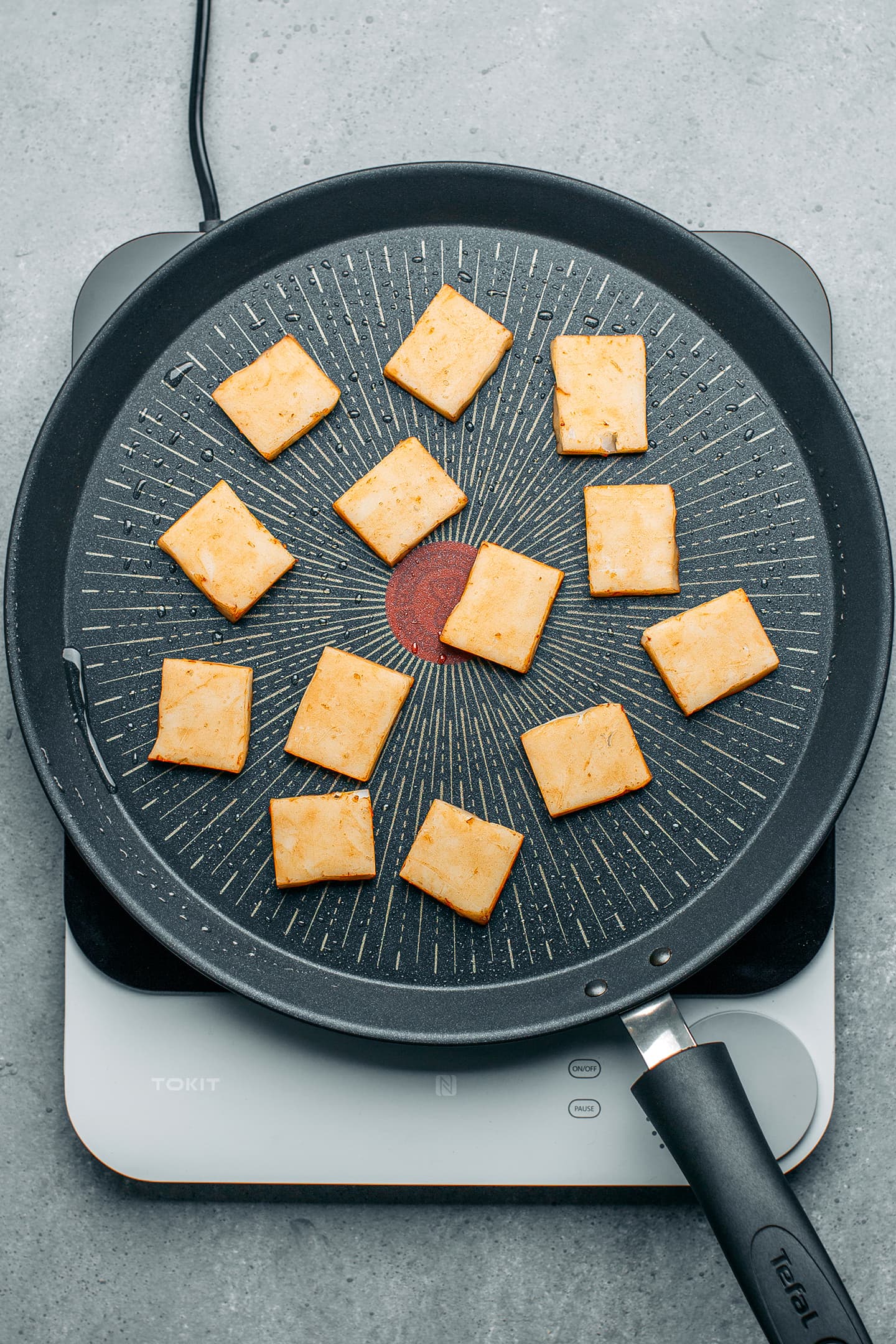 Fried bot chien on a skillet.