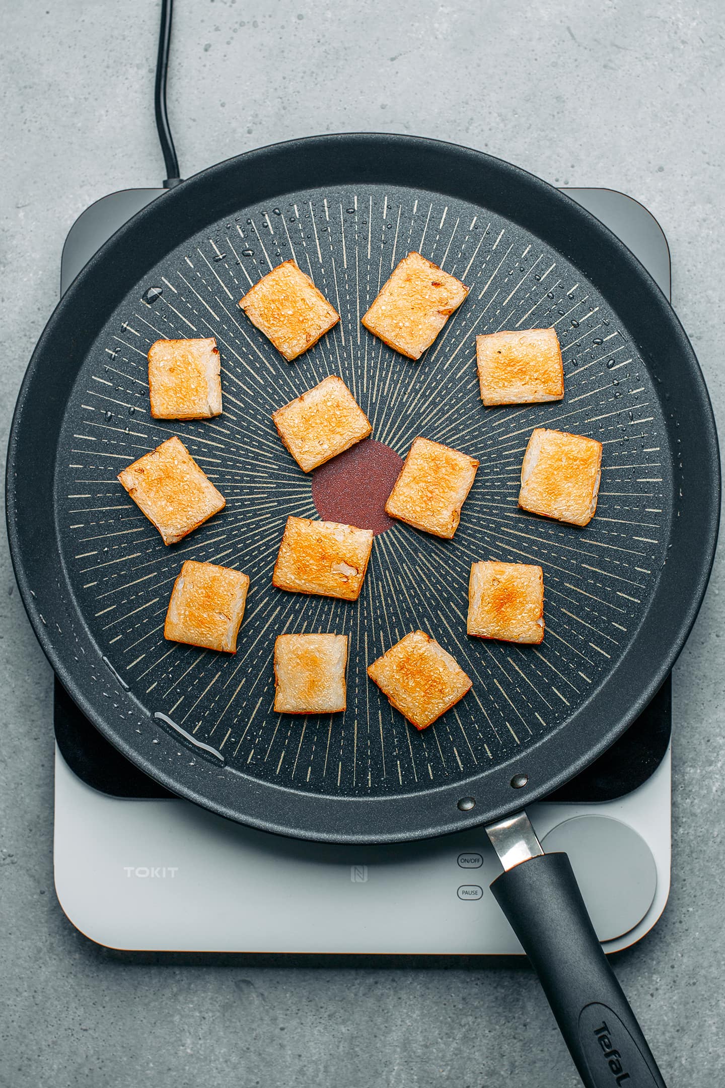 Golden brown bot chien in a skillet.