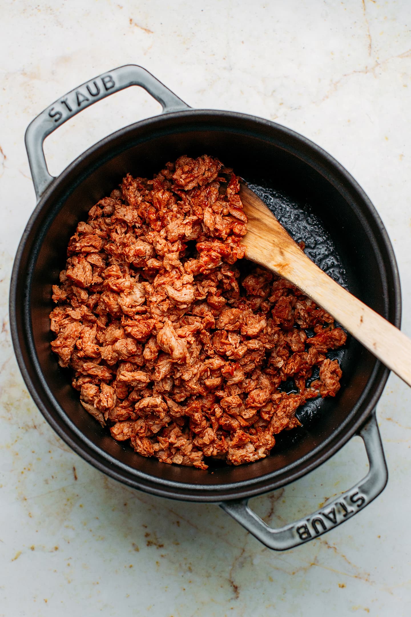 Sautéed soy curls in a pot.