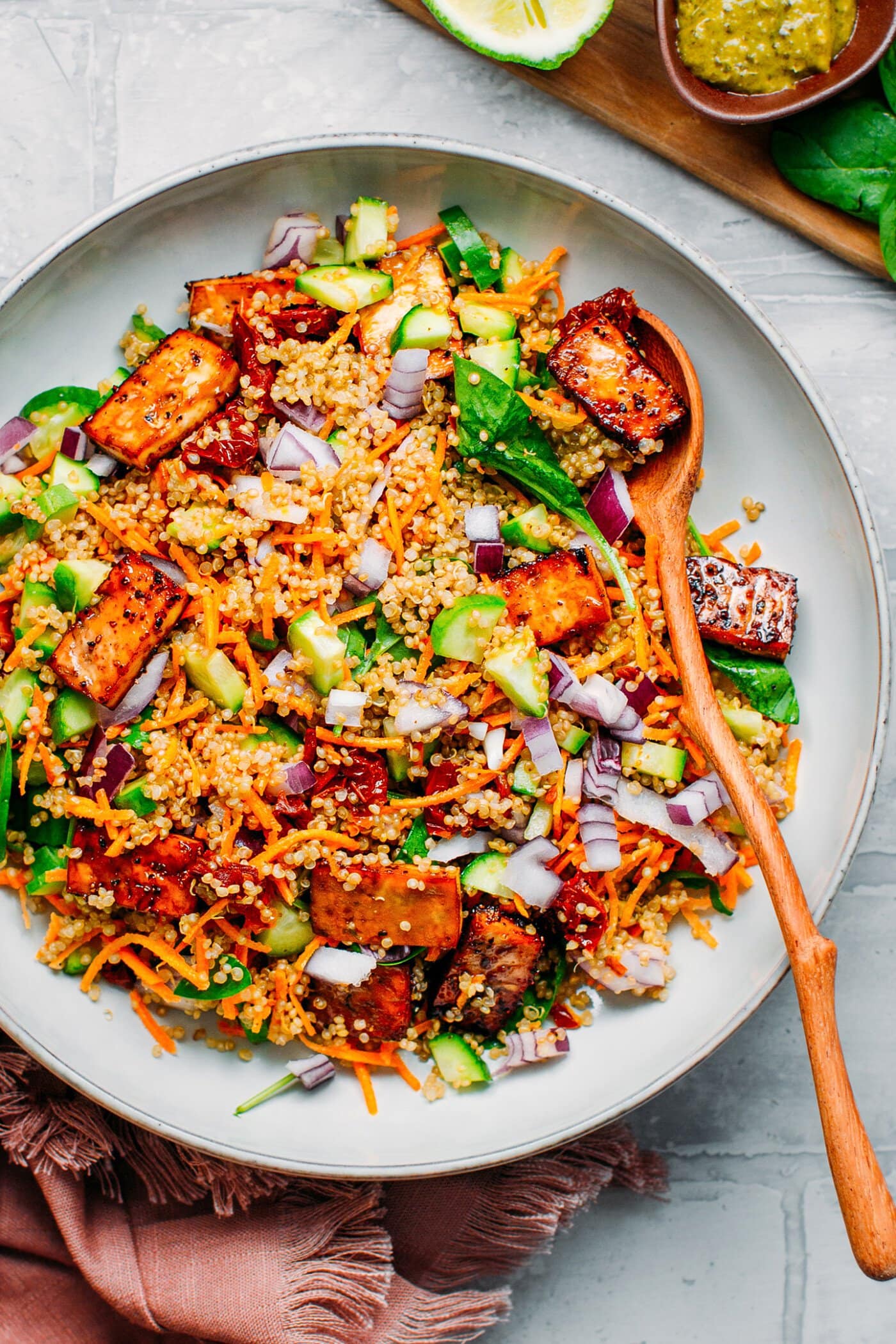 Close up of a Black Pepper Tofu Quinoa Salad in a plate.