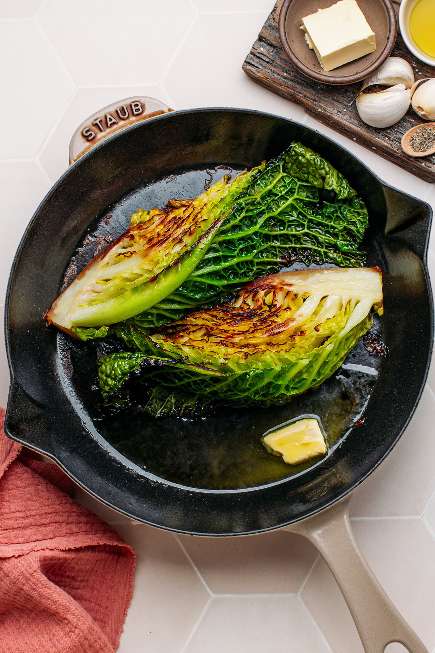 Braised savoy cabbage with butter in a skillet