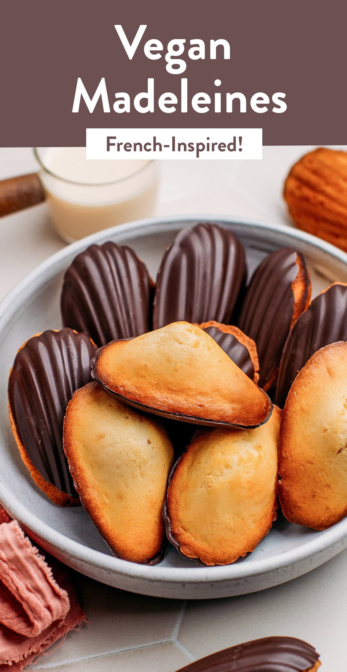 Learn how to make French-inspired vegan madeleines that are buttery, tender, and simply irresistible! These madeleines are baked to a perfect golden brown and can be dipped in dark chocolate to make them even more decadent. Just 8 ingredients and 1 bowl are required! #madeleines #vegan