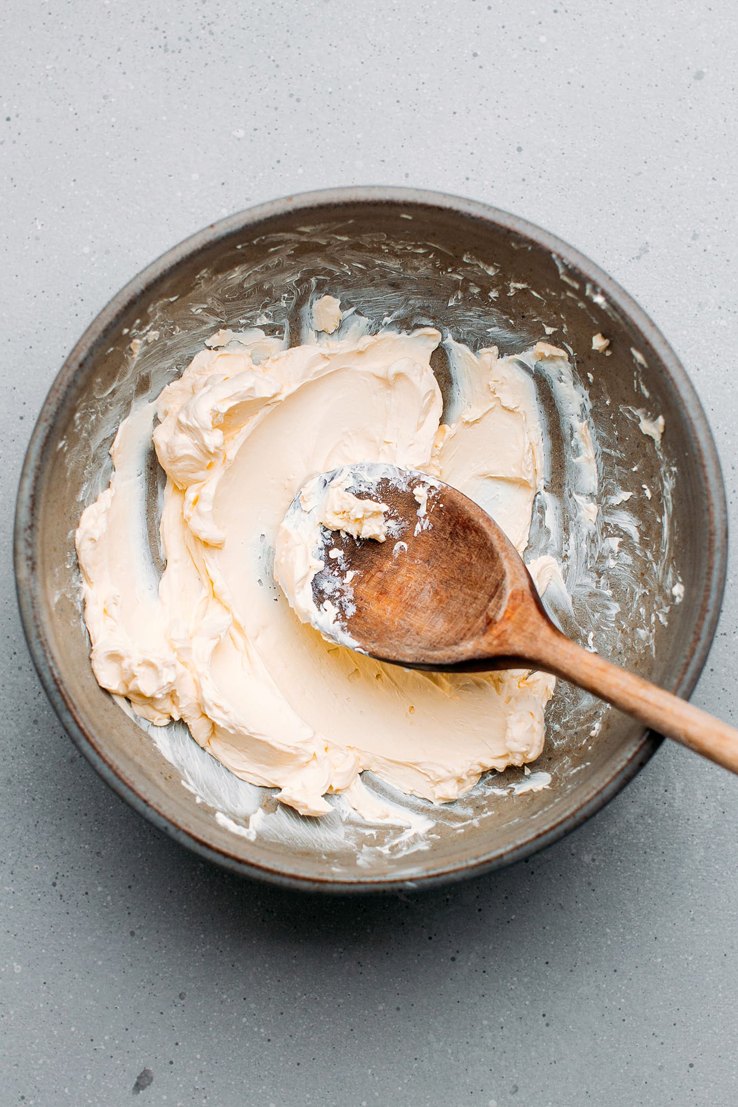 Creamed butter in a mixing bowl.