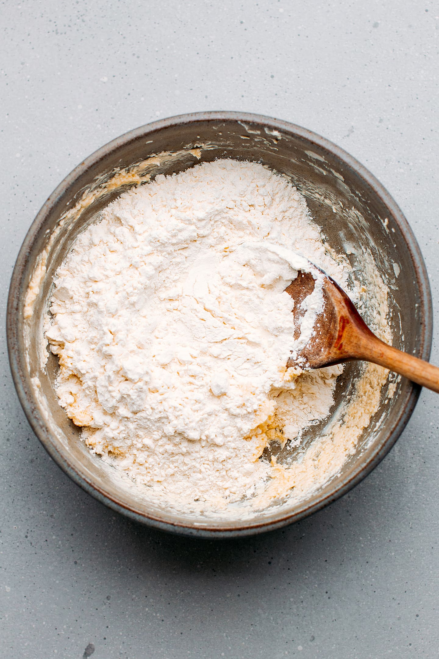 Flour and butter in a mixing bowl.