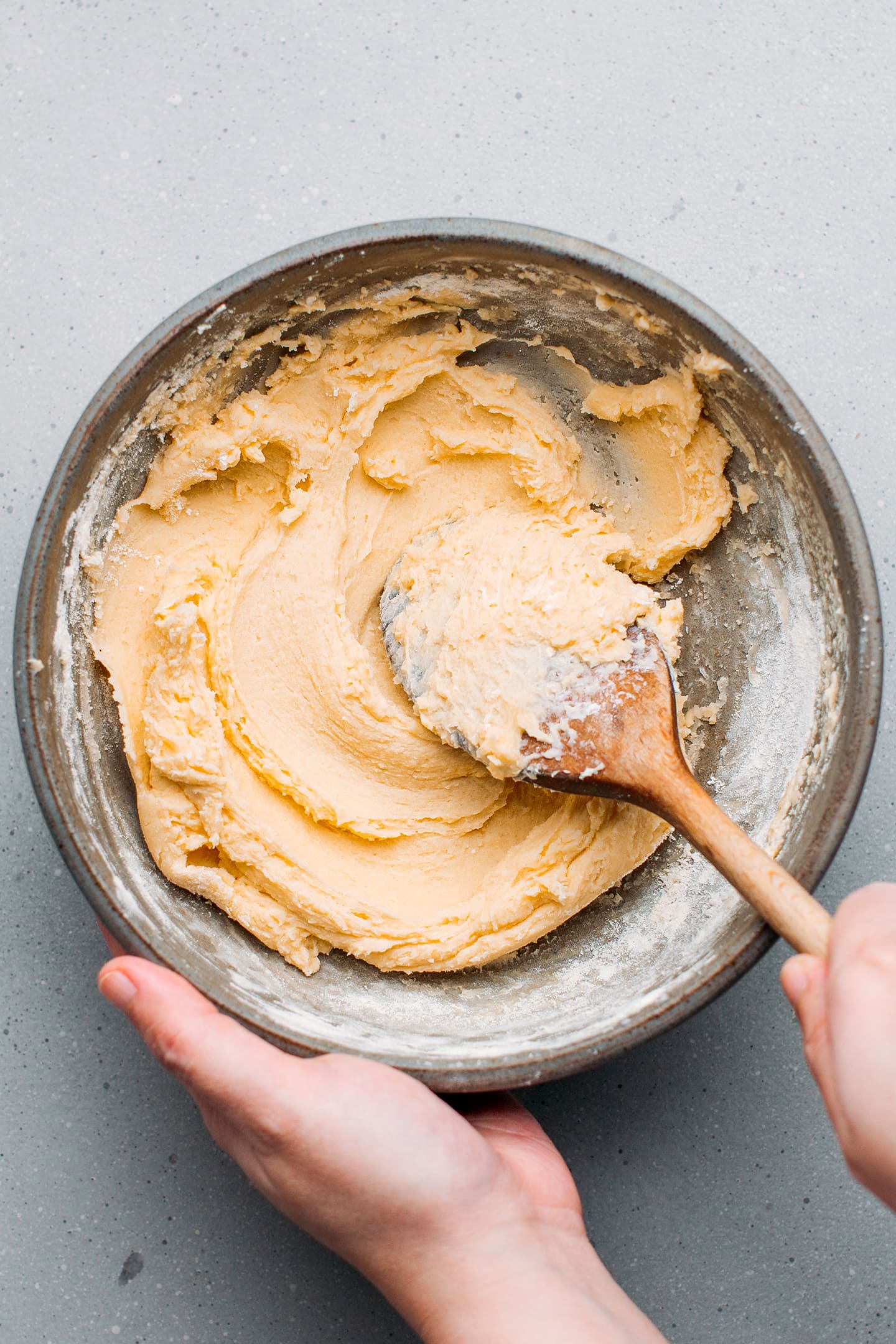 Cookie batter in a mixing bowl.