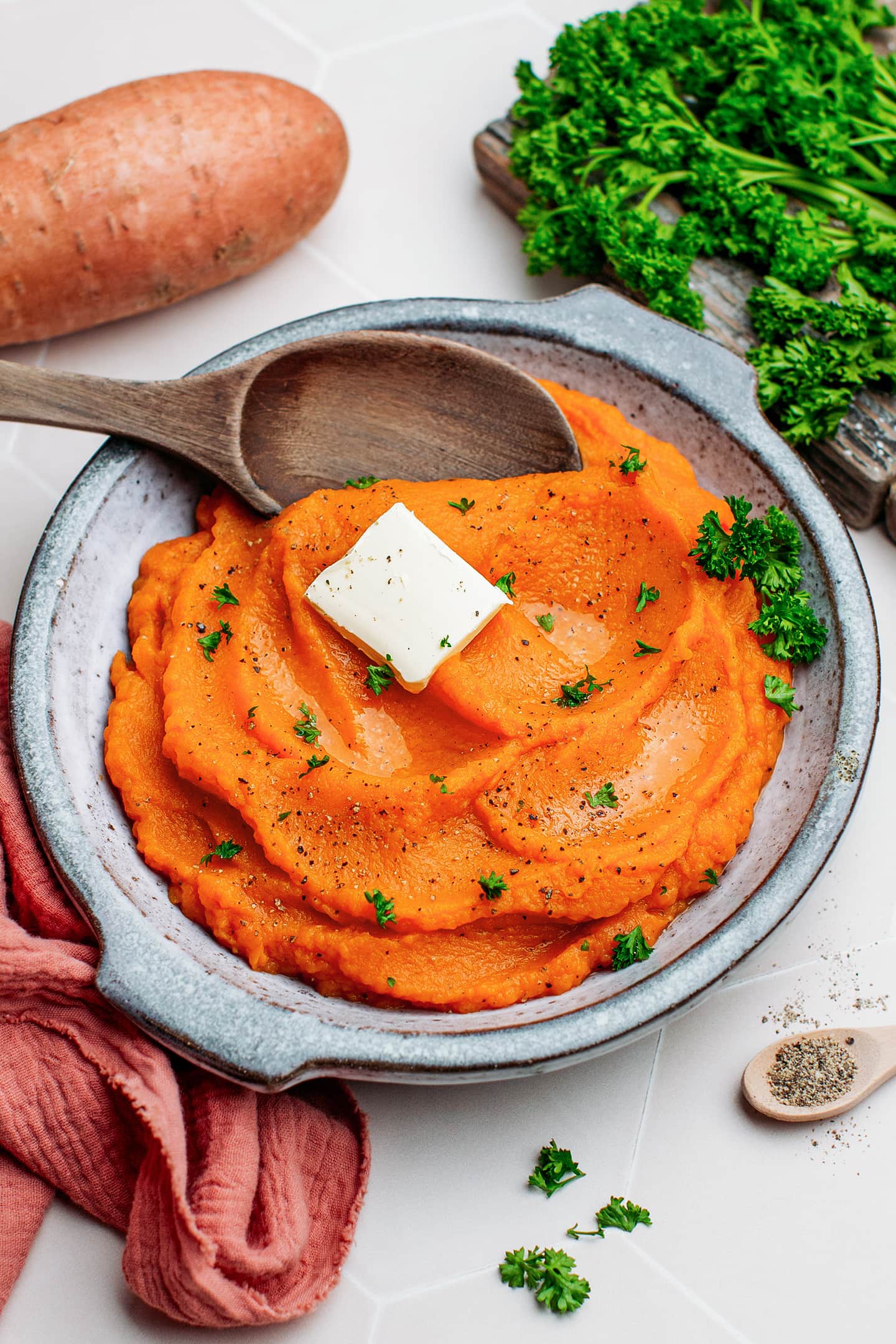 Mashed sweet potatoes in a serving plate.