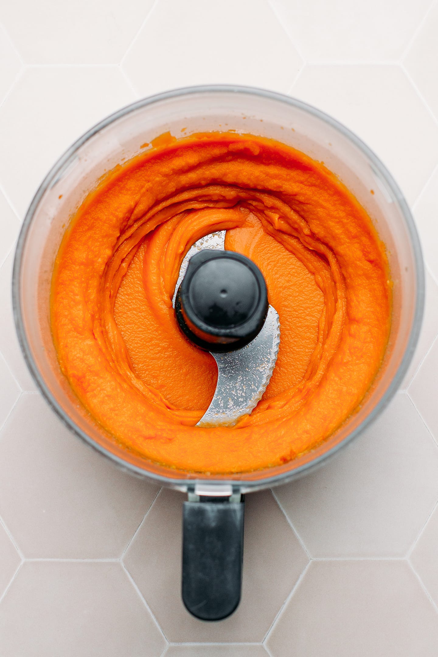 Mashed sweet potatoes in a food processor.