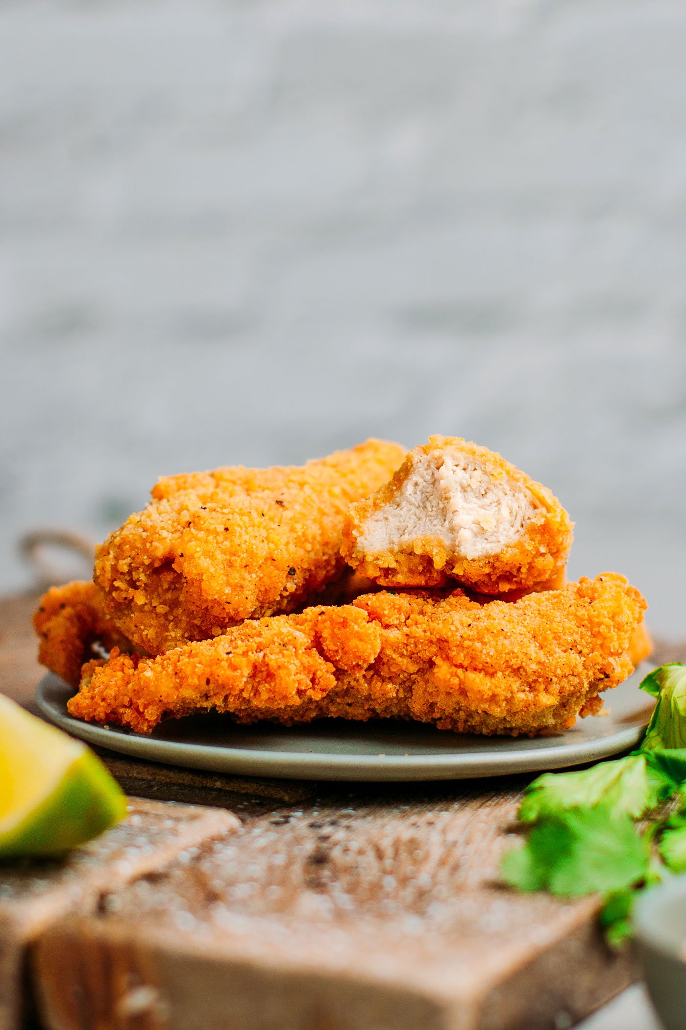 Delicious and crispy vegan chicken nuggets on a plate.