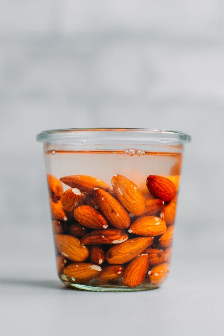 Raw almonds soaking in water.