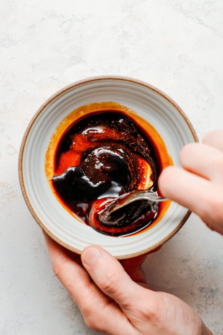 Making char siu sauce in a bowl.