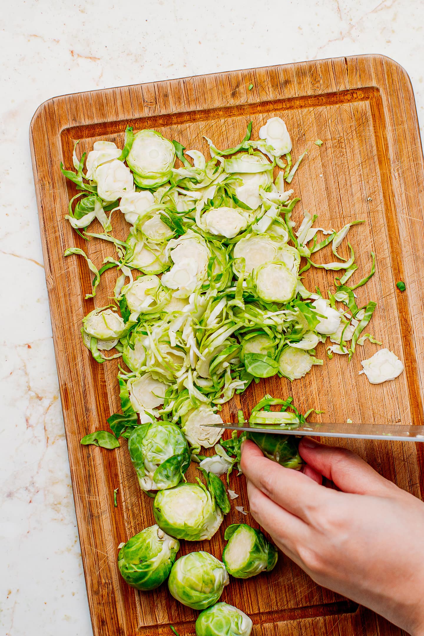 Slicing Brussels sprouts.