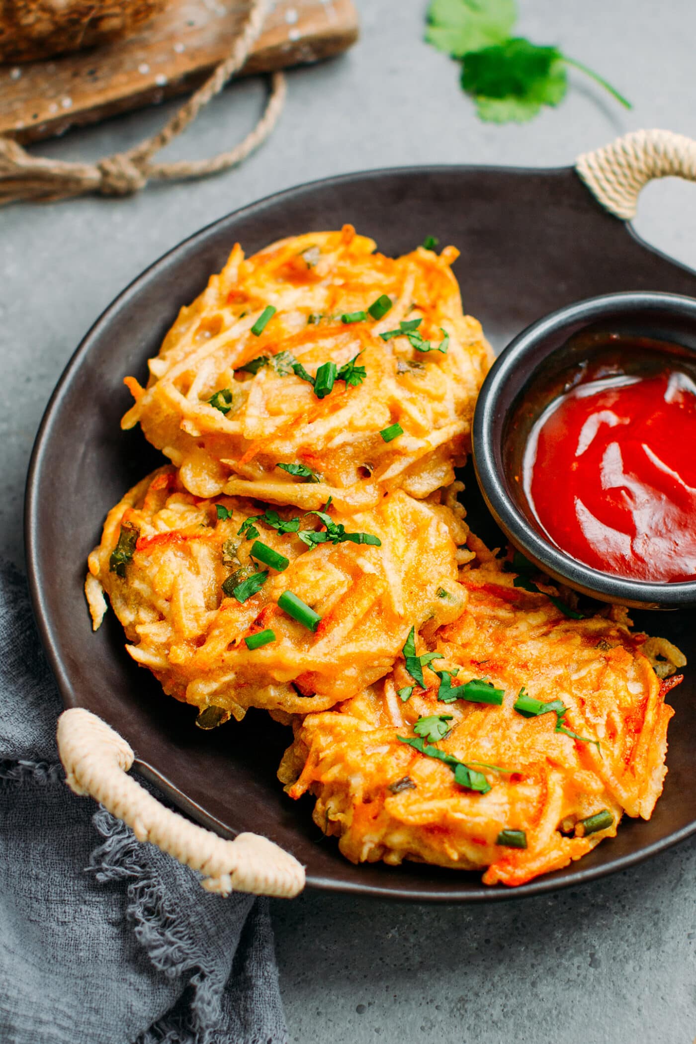 Taro fritters topped with green onions.