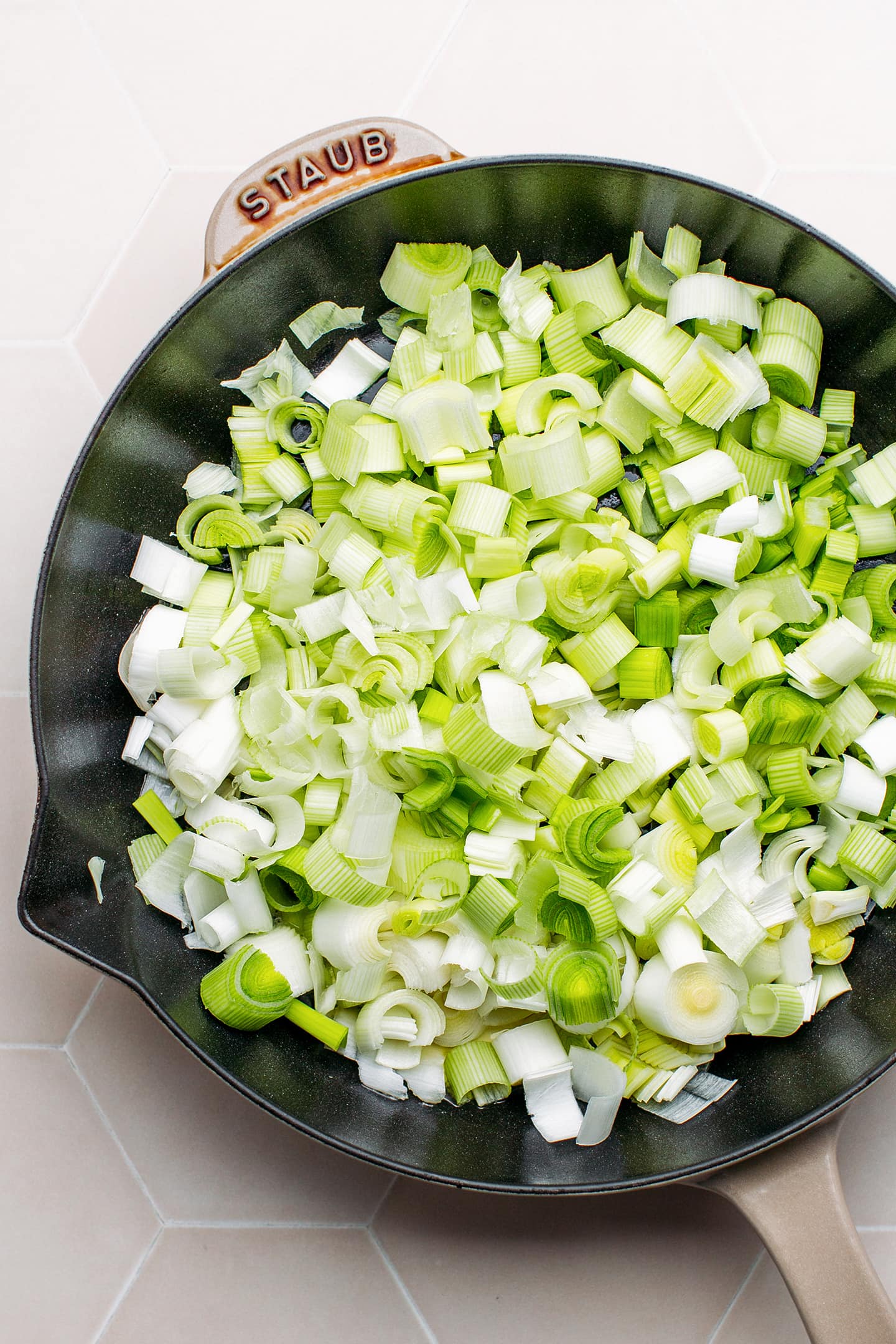 Sliced leeks in a pan.