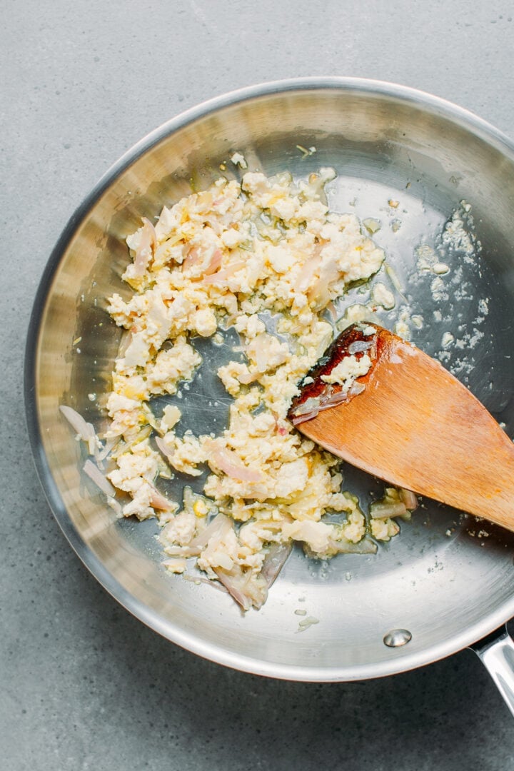 Fried shallots and garlic in a skillet.