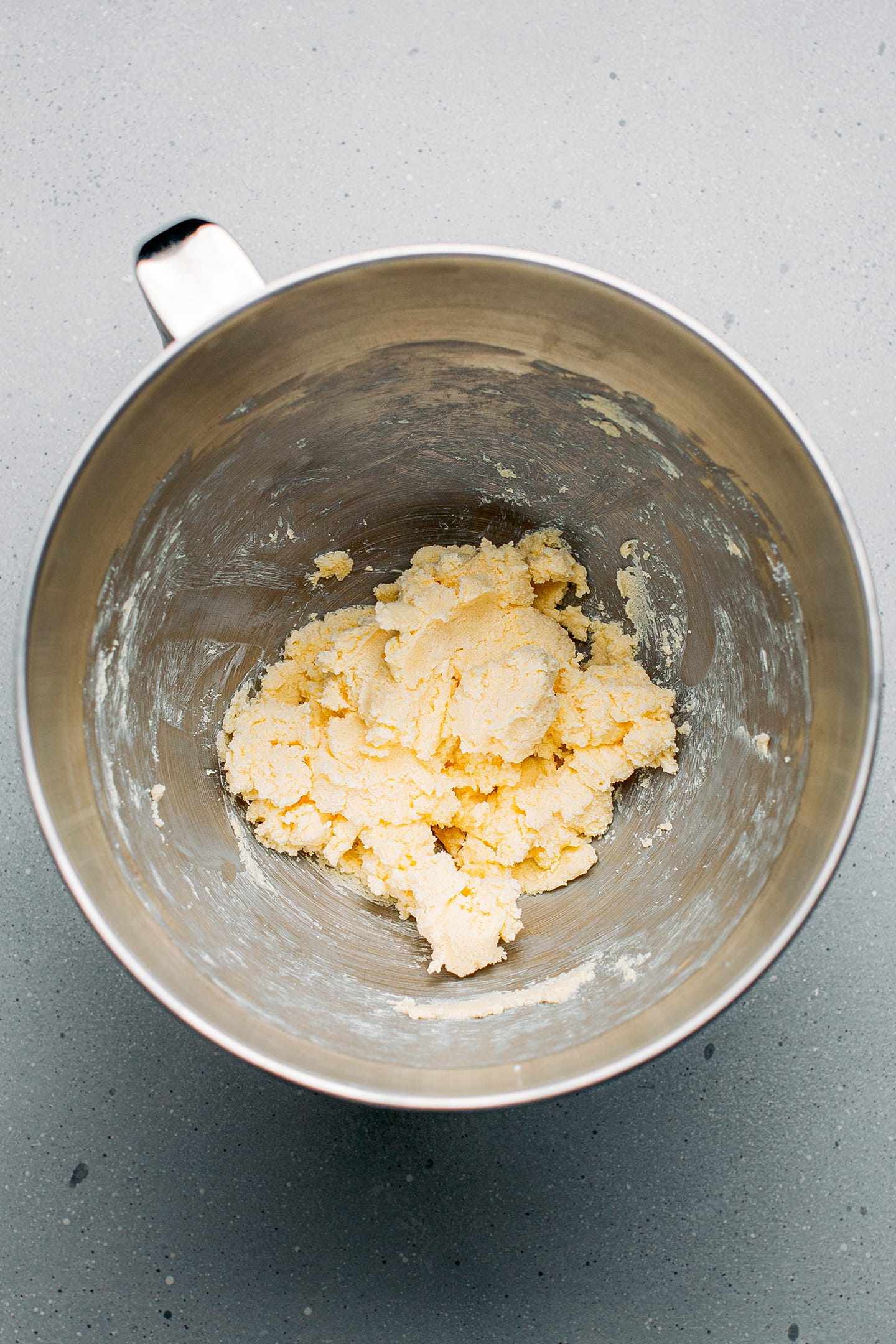 Creamed butter with sugar in a mixing bowl.