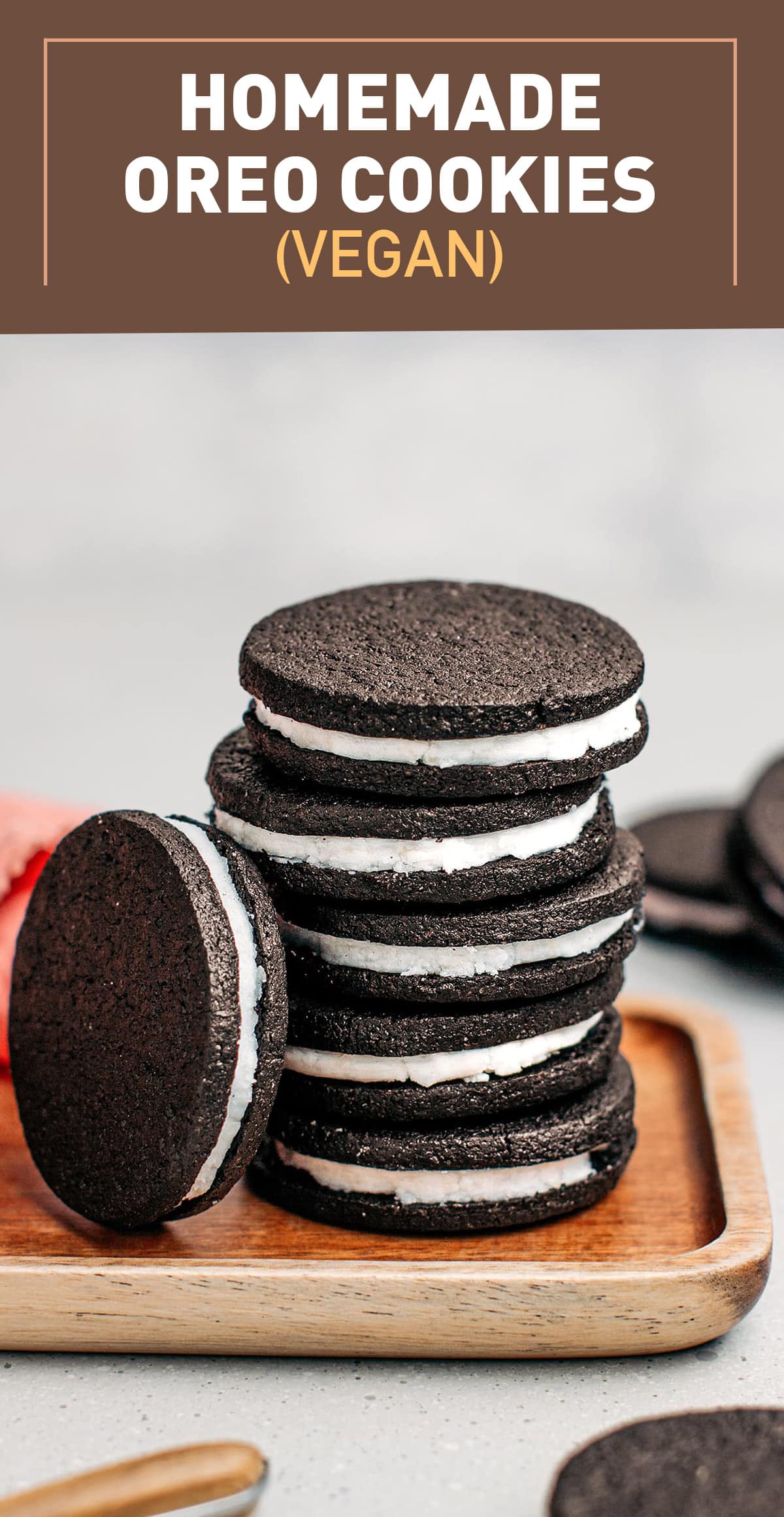 Relive your childhood memories with these homemade Oreo cookies! These school snack classics are simple to prepare, require just a few ingredients, and come out perfectly crispy every time! They are dark and chocolatey and generously filled with sweet vanilla filling! #homemadeoreo #vegancookies #veganbaking