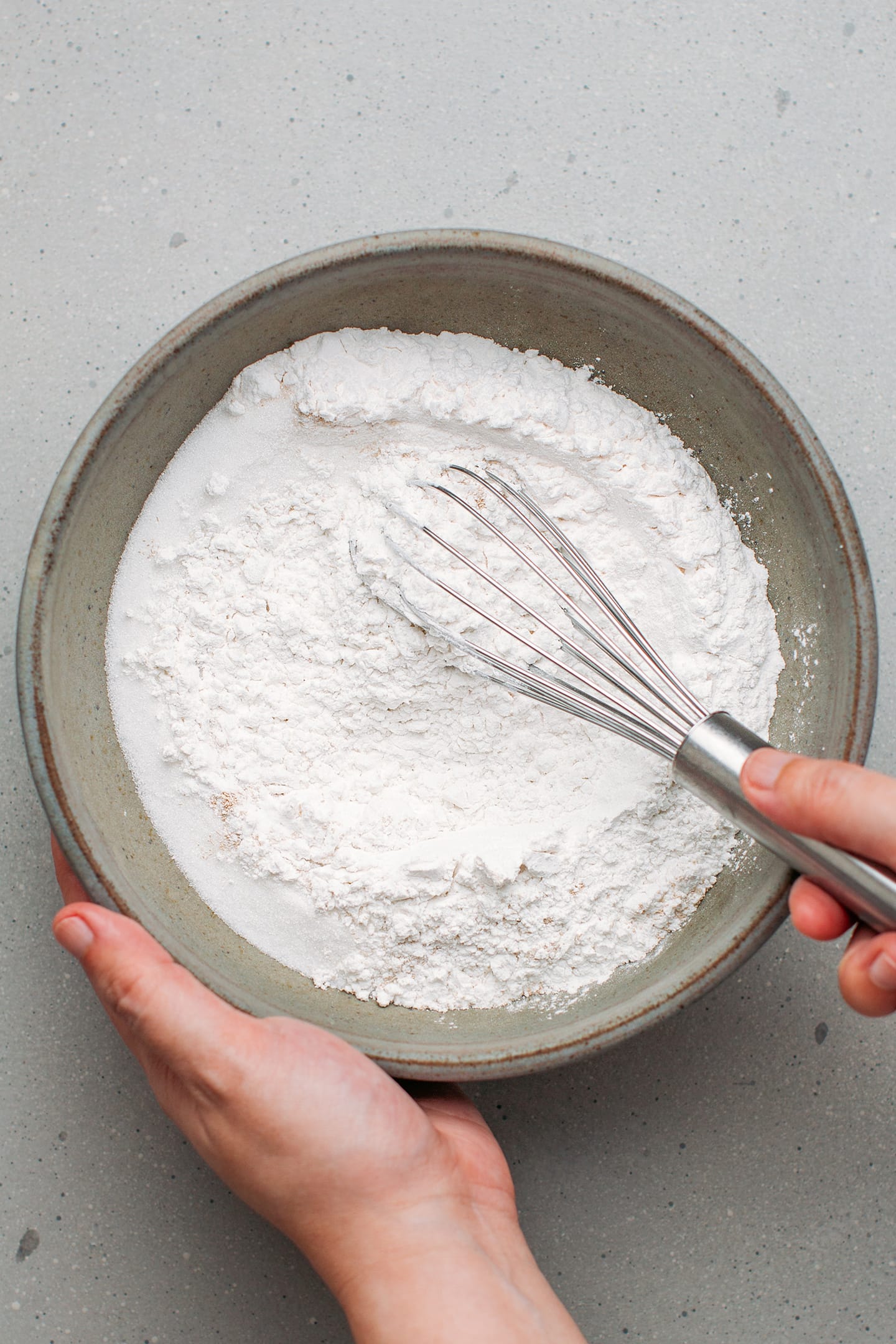 Whisking rice flour and tapioca starch.