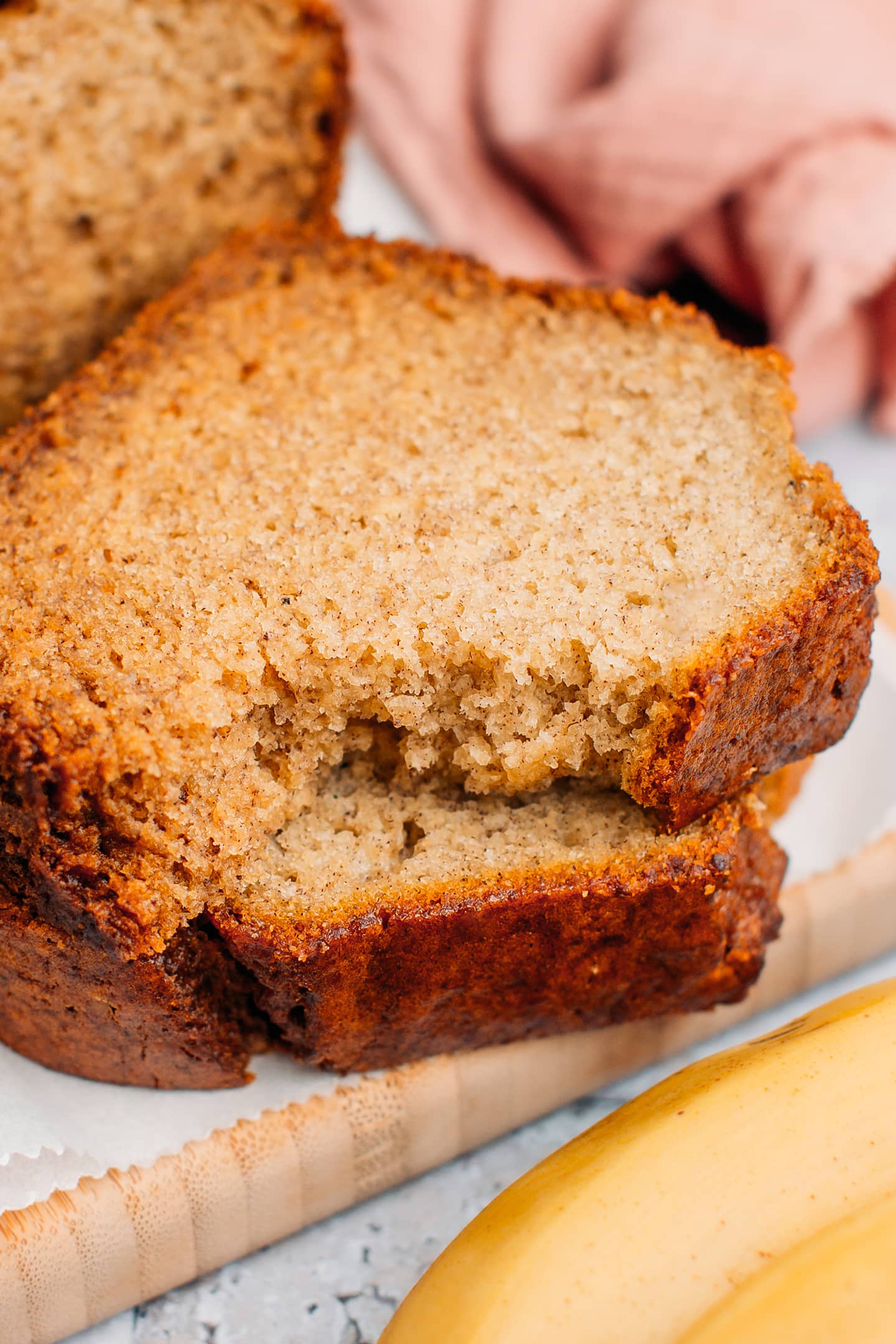 Close-up of two slices of banana bread.