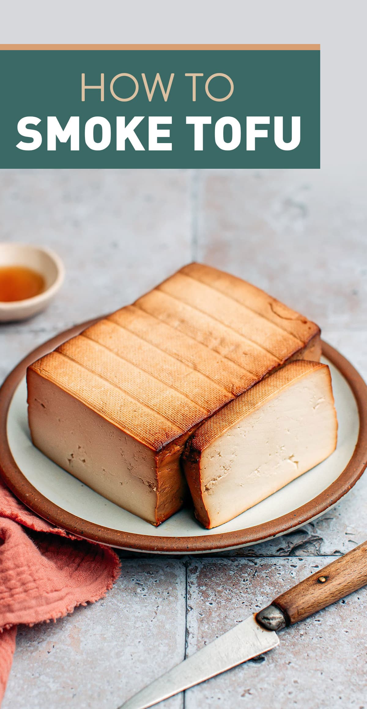 Learn how to smoke tofu in a stovetop smoker! Slowly smoked over hickory wood chips, this tofu has warming and woodsy notes and packs a ton of umami. Use it in curries, sandwiches, salads, stir-fries, and more! #smoked #tofu