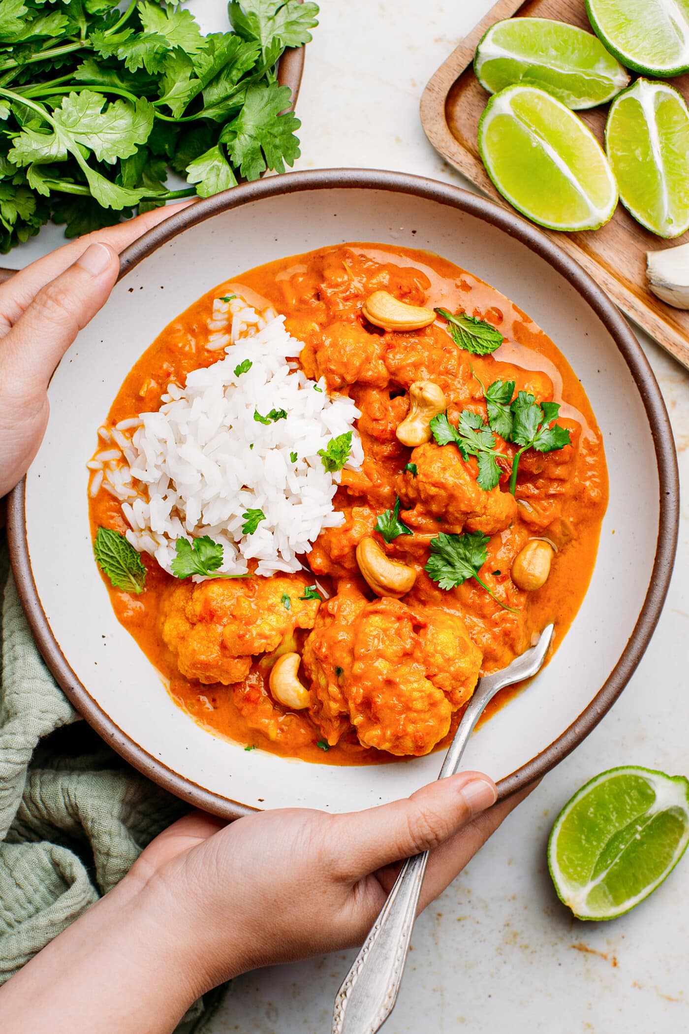 Instant Pot Cauliflower Tikka Masala curry in a ceramic bowl.