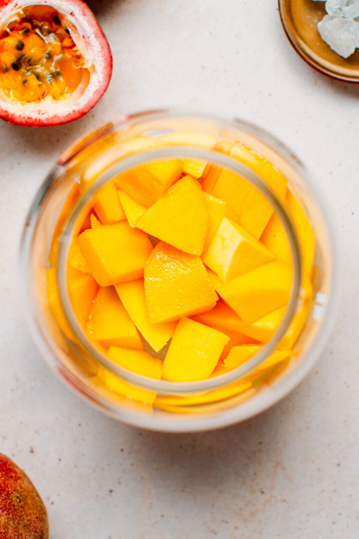Diced mango in a jar.