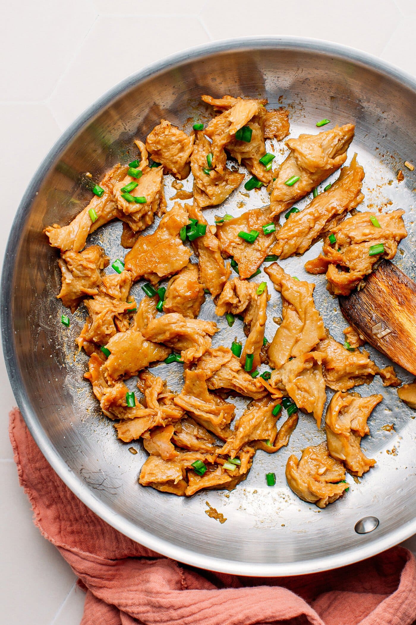 Vegan chicken with a soy marinade and green onions.