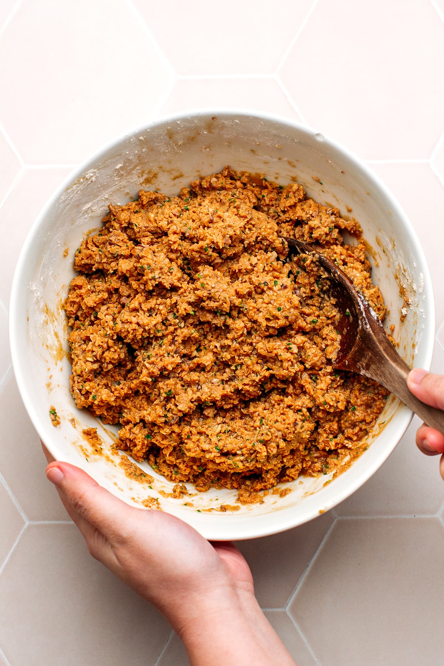 Mixing wheat gluten with soy curls.