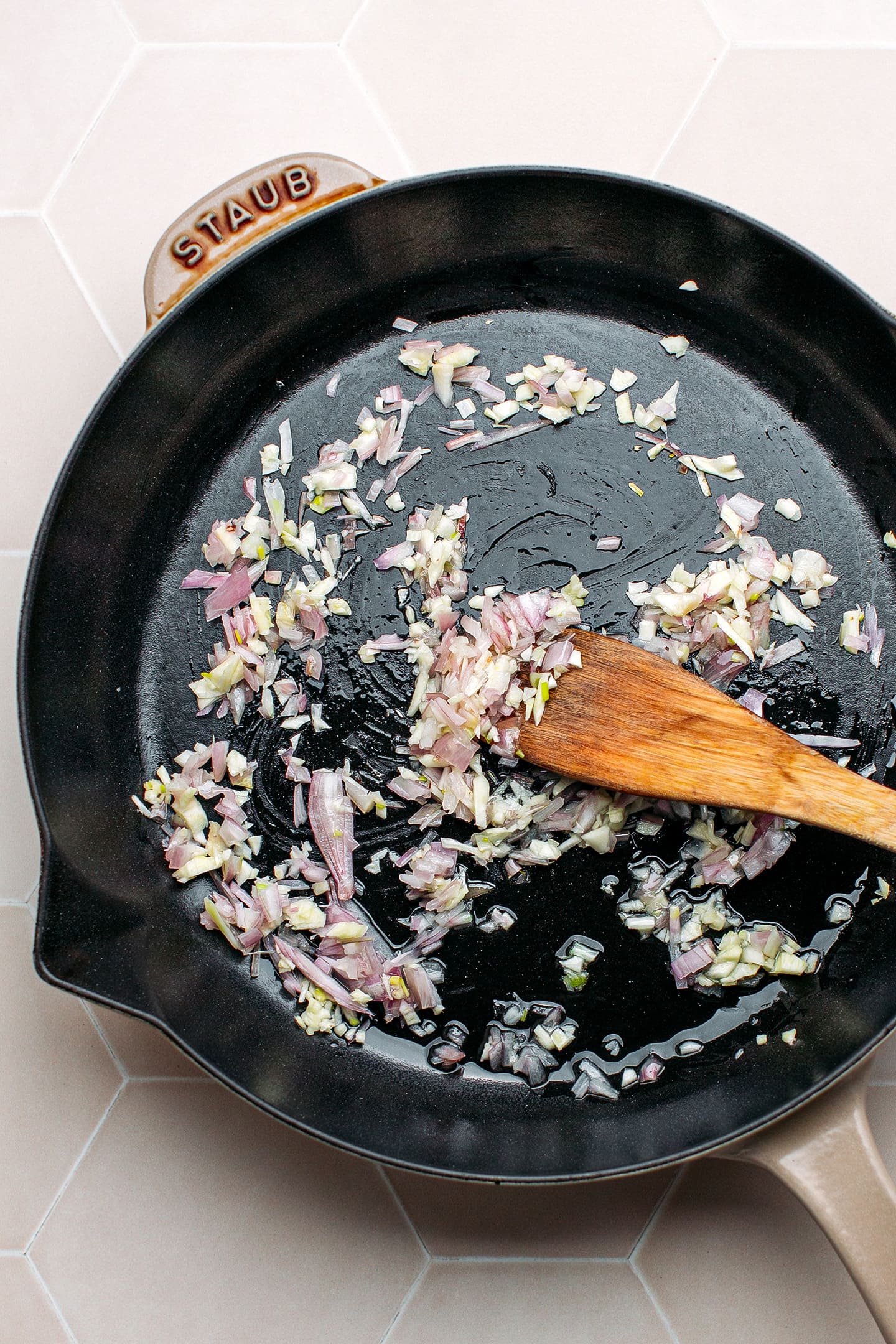 Garlic and shallots in a pan.