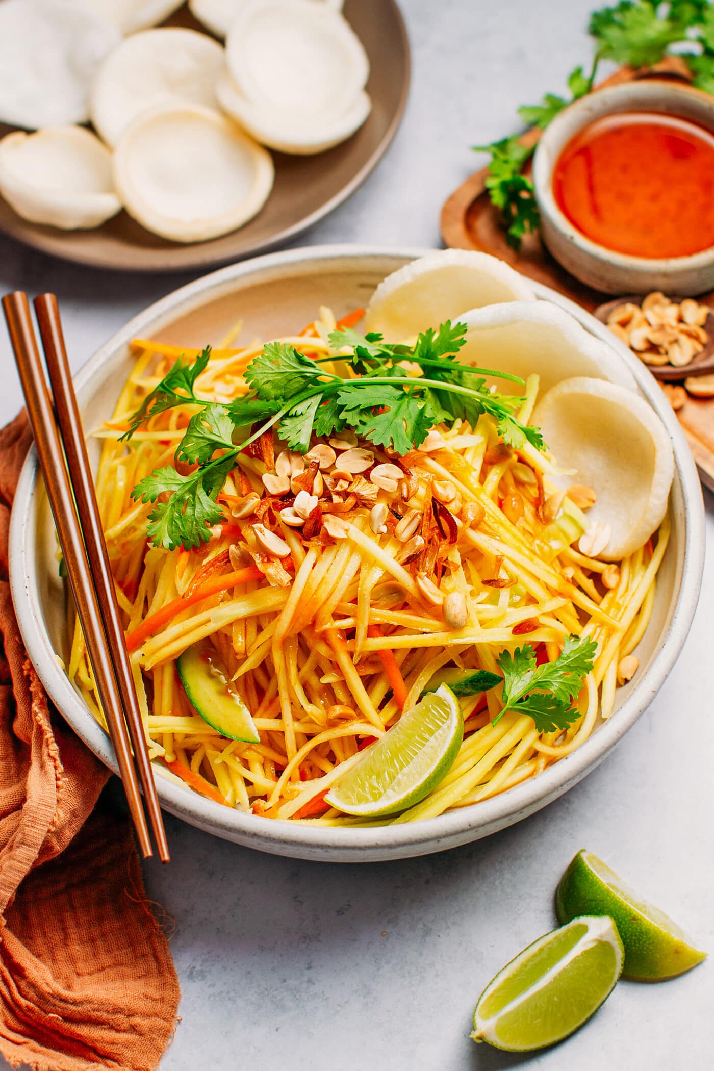 Thai green mango salad with cilantro, peanuts, and fried shallots.