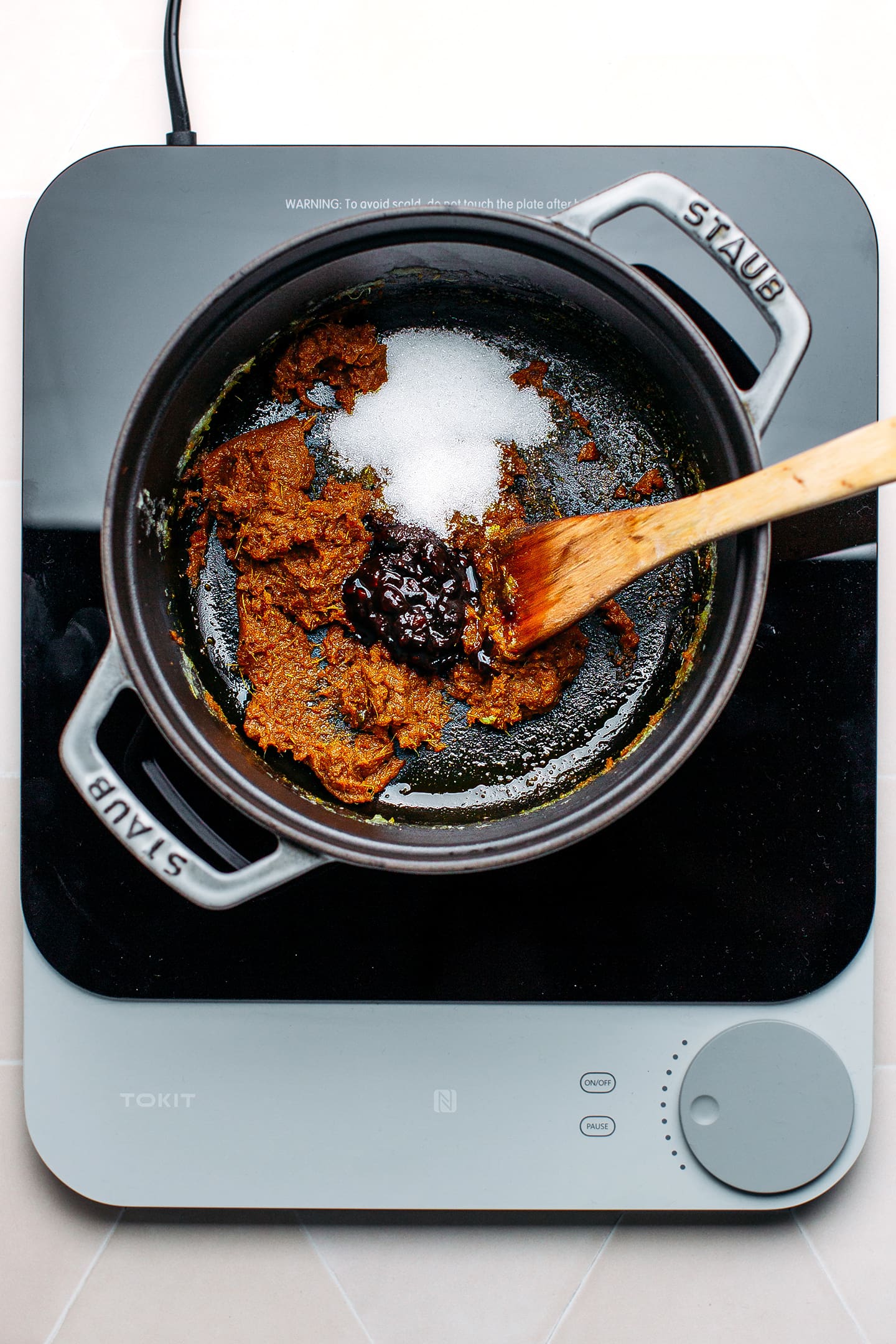 Curry paste and fermented bean paste in a pot.