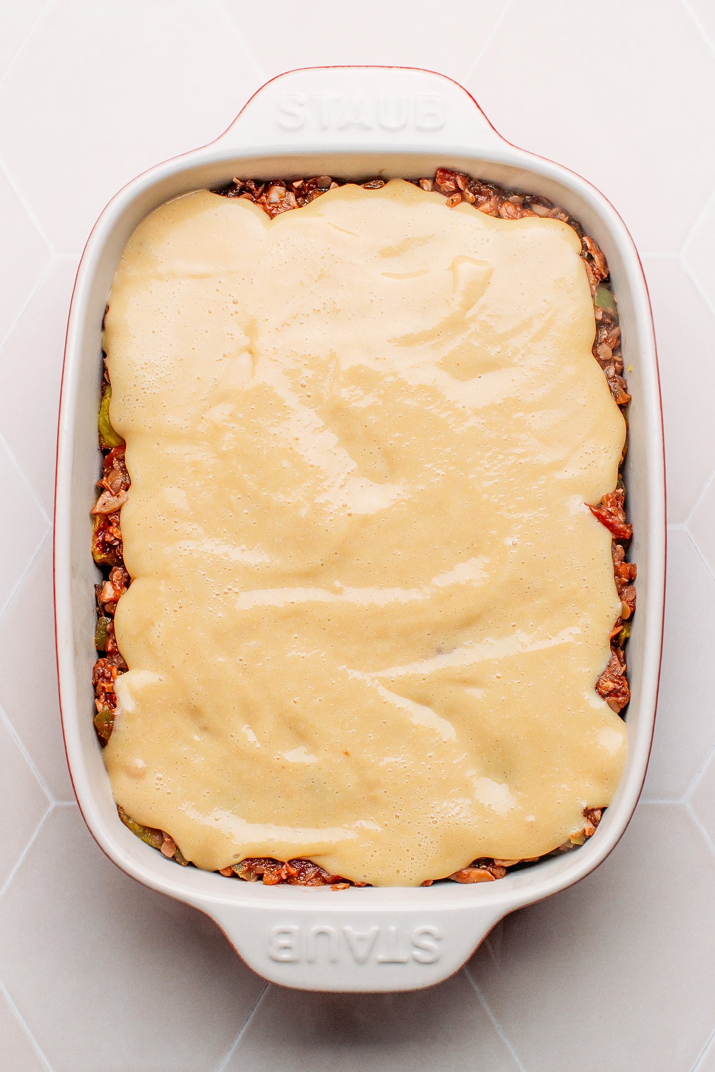 Vegan cheese sauce in a baking dish.