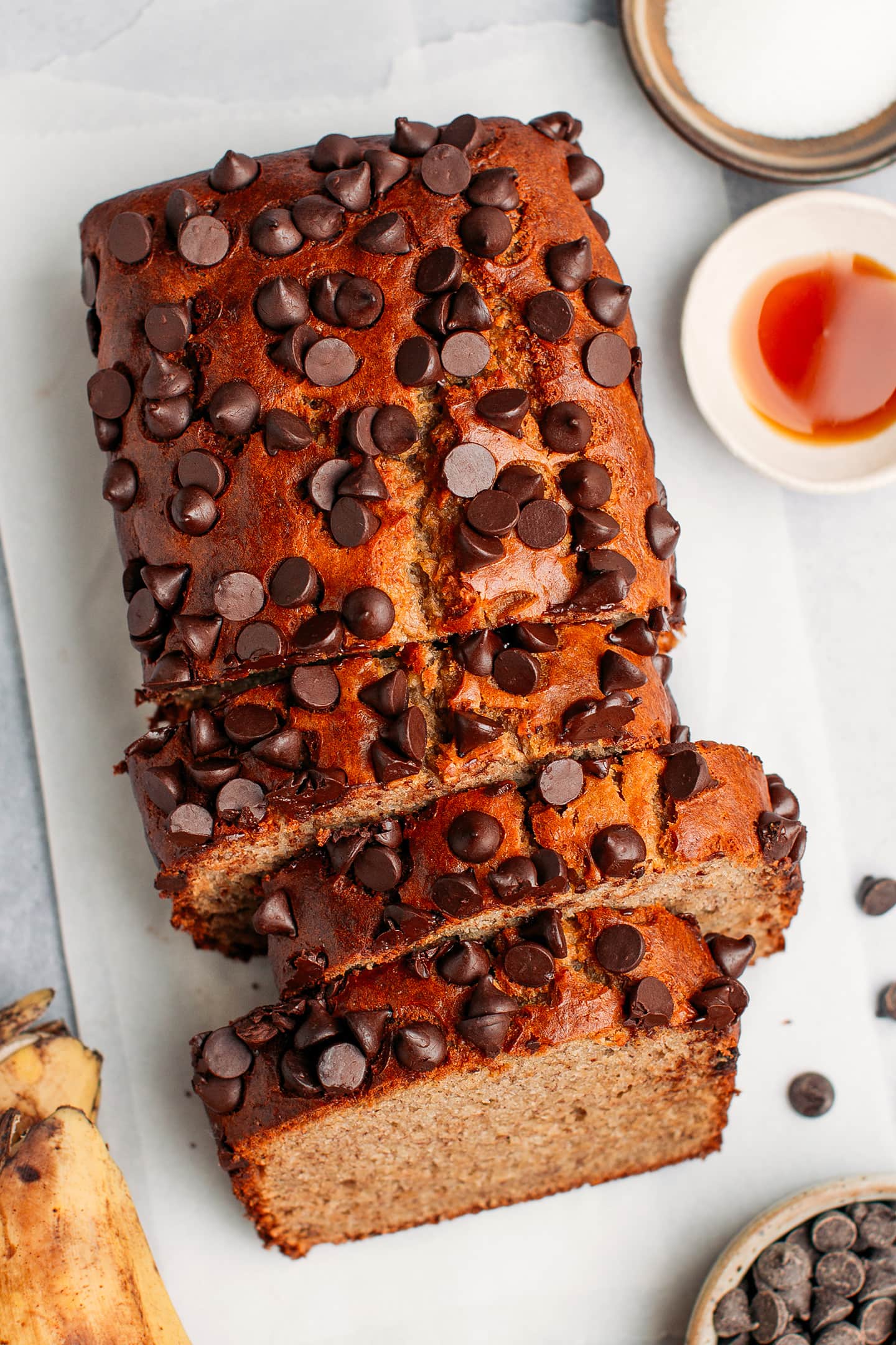 Top view of banana bread topped with chocolate chips.