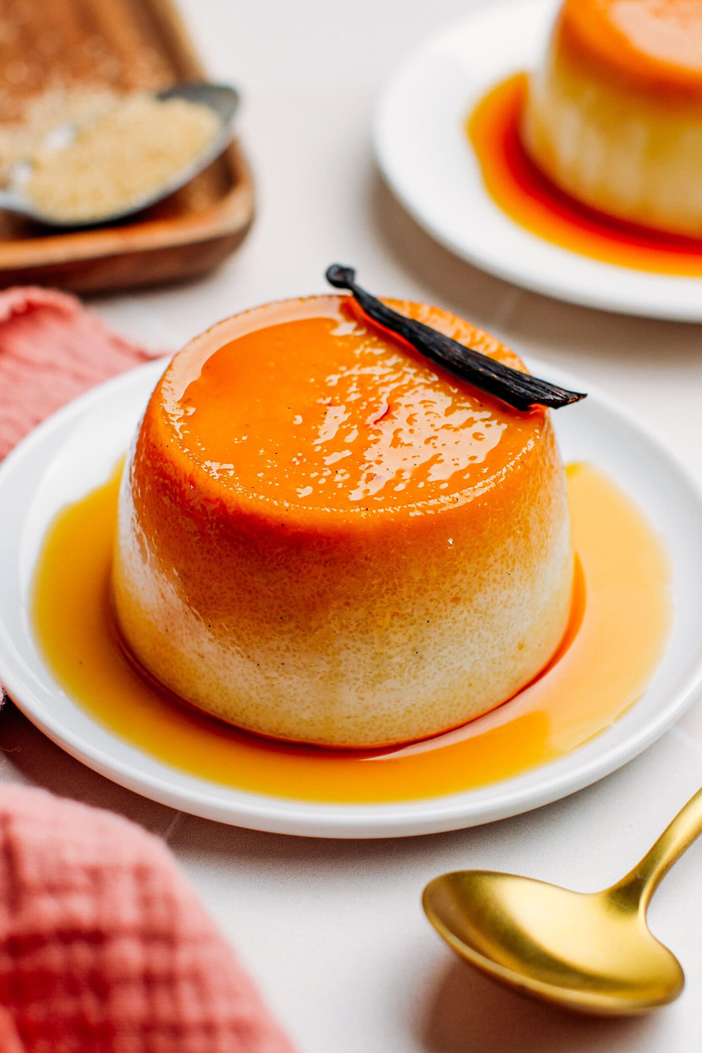 Semolina pudding topped with caramel sauce and vanilla bean.